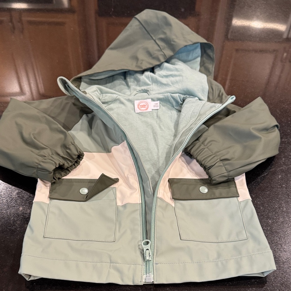 Kids Green Hooded  rain ☔️. Jacket - Picture 6 of 7